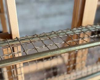 This lot features an antique brass train car luggage rack in very good condition that measures, 29.5” W x 12.5” D.