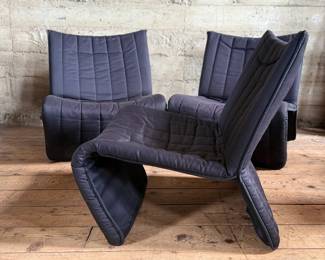 This lot features three (3) Kebe Ribbon Chairs designed by Niels Bendtsen in 1975, featuring a black tubular steel frame and quilted fabric. Each chair measures, 28” H x 25” W x 29” D.