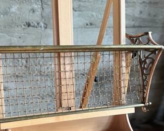 This lot features an antique brass train car luggage rack in very good condition that measures, 29.5” W x 12.5” D.
