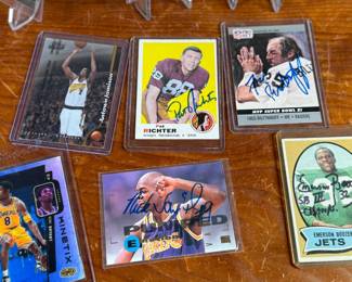 This lot features a collection of sports cards in various conditions. Some athletes include Kobe Bryant, Pat Richter, Emerson Boozer, and others. Some appear to be signed.
