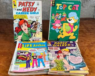 This lot features a large collection of antique comic books with numerous titles including, Top Cat, Patsy Walker, Archie, and more.