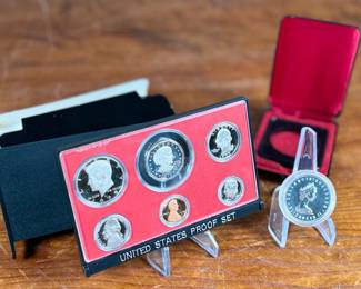 This lot features a Canadian silver dollar composed of 50% silver and a United States proof set from 1979.