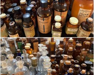 Large collection of antique apothecary jars and bottles 