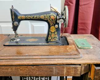 Vintage Singer sewing machine with treadle base