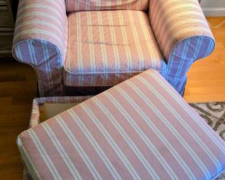 Red striped armchair was stored in ottoman