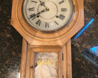 Vintage regulator wall clock with key