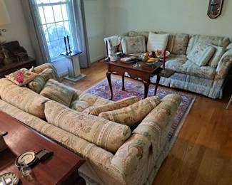 Living room sofa, loveseat and tea table.