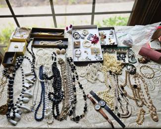 $1.00 each costume jewelry, unless marked