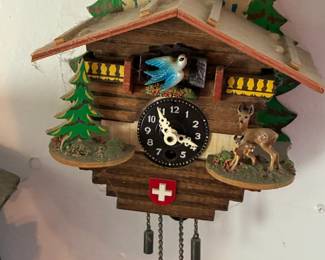 Cuckoo clock with weights