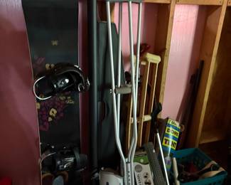 Snowboard, crutches 