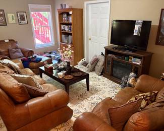 Leather sofa, chair and ottoman and loveseat