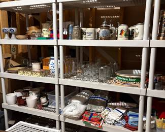 Linens, beer steins, flower pots