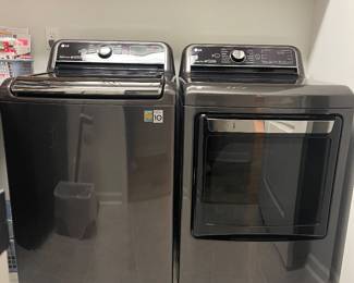 LG washer machine and dryer in pristine pre-owned condition.