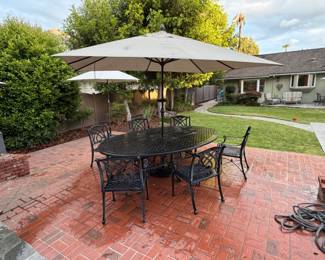 Oval CastTop Dining Table and chairs In Onyx Aluminum