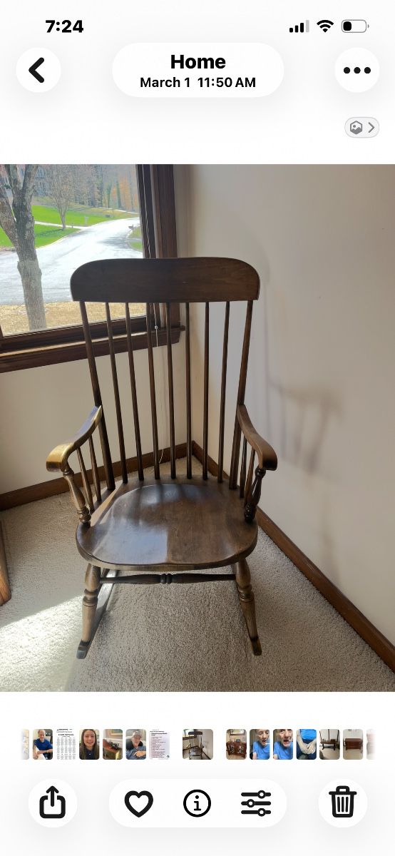 vintage Hitchcock dark wood spindle-back rocking chair featuring a classic Windsor-inspired design with slender vertical spindles.