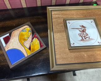 Two collectors' framed tiles