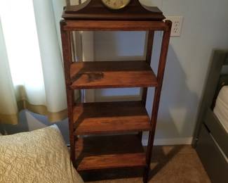 Bookcase; mantel clock