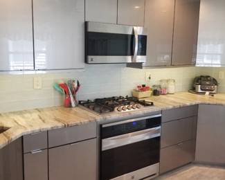 Kitchen includes all upper & lower cabinets; counters, sink, faucet & disposal