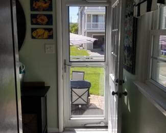 Storm door with internal screen