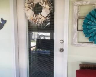 Entry door with interior blinds