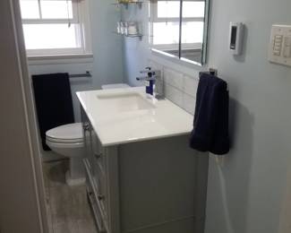 Bath vanity; mirrored medicine cabinet