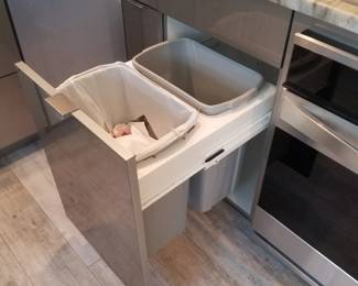 Kitchen cabinetry detail: trash corral