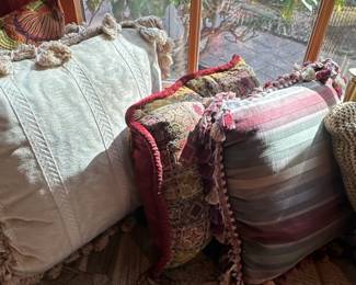 Assorted Decorative Throw Pillows with Floral, Tassel, and Geometric Designs second image
