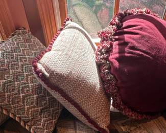 Assorted Decorative Throw Pillows with Floral, Tassel, and Geometric Designs fourth image