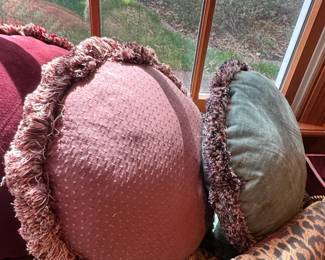 Assorted Decorative Throw Pillows with Floral, Tassel, and Geometric Designs fifth image