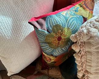 Assorted Decorative Throw Pillows with Floral, Tassel, and Geometric Designs