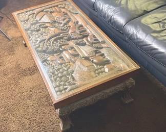 Wood Coffee Table Featuring Carved Asian Inspired Art