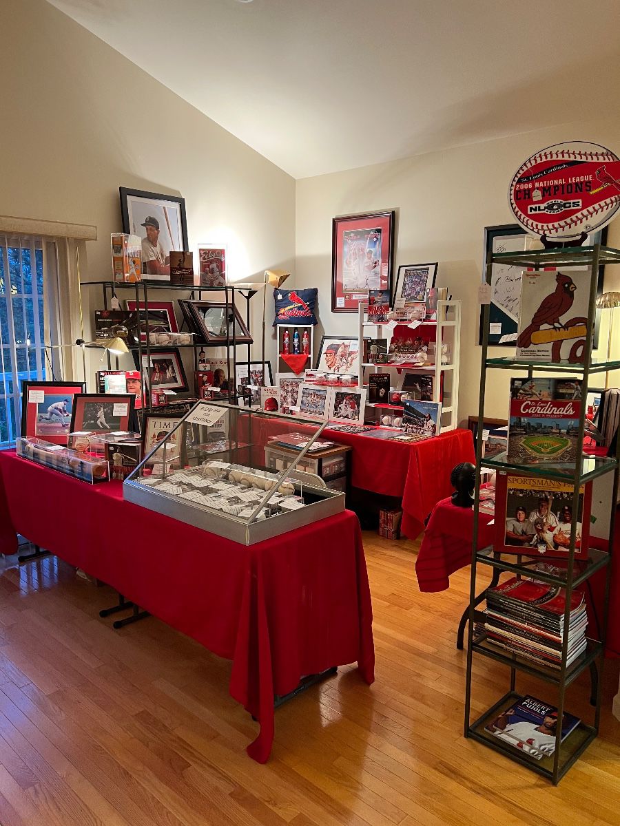WELCOME… A plethora o us of autographed sports memorabilia including signed baseballs, photographs, numerous prints, hat, and bat, nearly all with Cardinals Certificates of Authenticity or MLB holograms. Several Hall of Famer's. Tons of other pieces of baseball memorabilia including yearbooks, pin sets, cereal boxes, books, pennants, display cases and other items two numerous to mention. if you were a St. Louis Cardinals fan you do not want to miss this sale!  Large collection of American Indian artifacts including pottery, Kachina's, fetishes and other items to numerous to mention. Superb EARLY 20th century Navajo weaving, lovely contemporary bronze sculpture, and several pieces of wall art. 