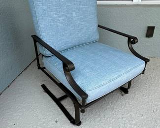 Outdoor Rocking Chair with Blue Cushions