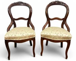 A Pair of Victorian Balloon Back Chairs