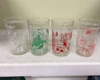 Flintstone jelly glasses. 