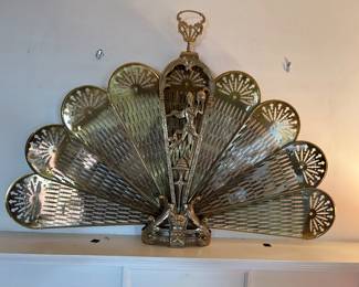 Brass fireplace decoration.