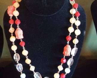 Double Strand Buddha Head and Carnelian, Quartz, and Crystal Necklace