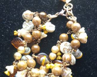 Bohemian Beaded Bracelet with Shell, Leaf, and Floral Charms