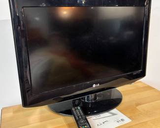FURN29 small LG flat screen TV