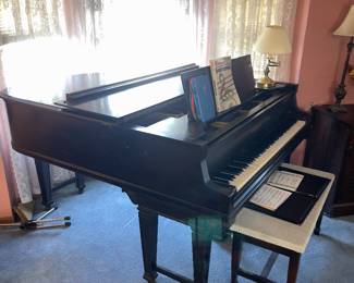Baby grand piano in good condition