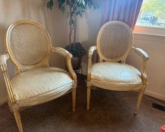 Pair of French provincial cane back chairs