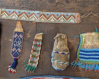 Native American beaded bags, arms bands and watch fobs