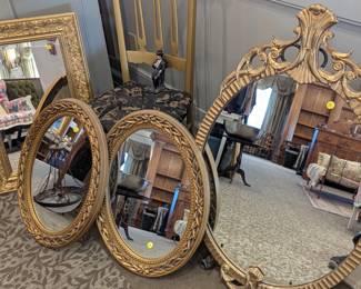 Gold mirrors, wooden and vintage plastic