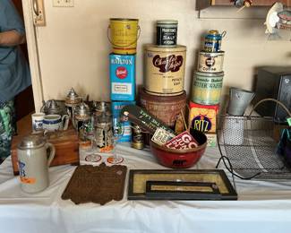 Vintage advertising tins and German steins