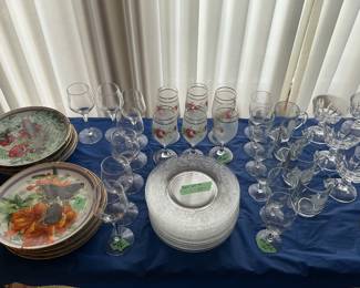 Sets of floral plates, clear glass plates, multiple sets of glasses