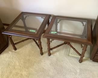 Square accent tables with glass tops measure 20” w  x 16” h