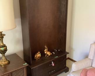 Wood shelving…shelves are available…cabinet below
