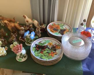16 plates with florals and butterflies