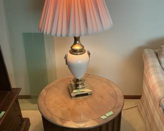 Ceramic and brass lamp on round end table