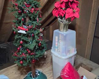 Lots of Holiday Items it the walk in Attic area